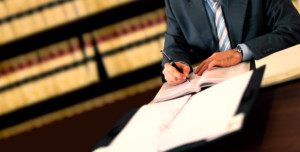 Memphis Injury Law Firm- man writing document